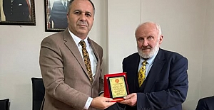 MHP İl Başkanı Çıplak'tan Erdoğan’a teşekkür plaketi